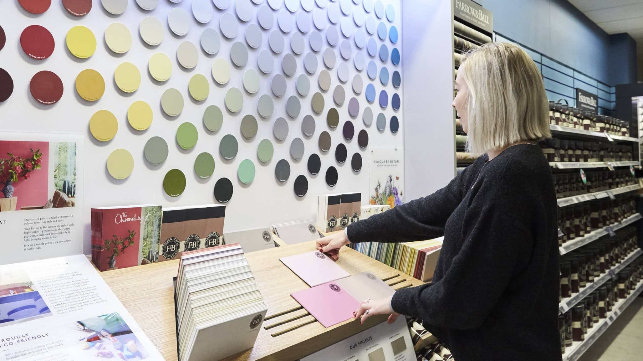 Choosing Farrow & Ball colour samples in store
